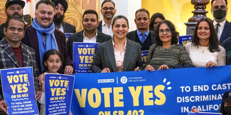 Aisha Wahab, center, with supporters following a news conference where she proposed SB 403, in Sacramento, Calif., on March 22, 2023.